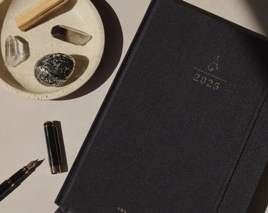 boy doing heart hand symbol